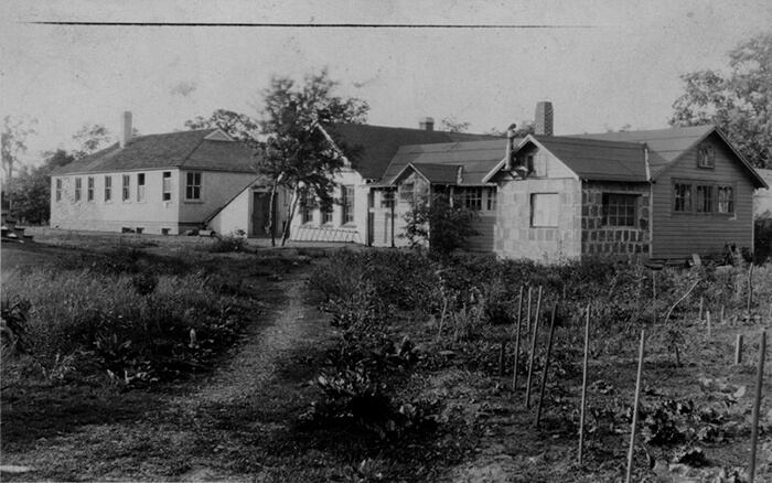 School building and shop (ca.1920), photo by Oscar Stechbardt, courtesy of Special Collections and University Archives, Rutgers University Libraries