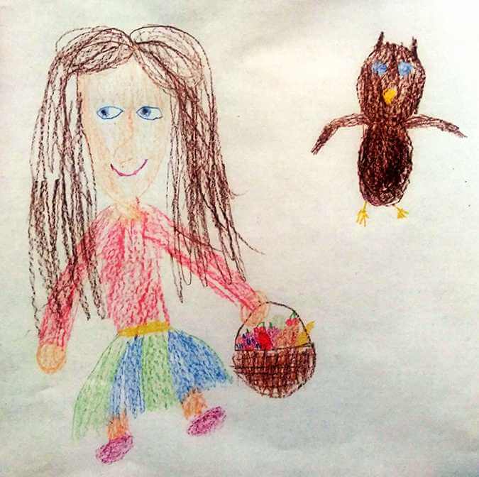 a young person's drawing of a girl and an owl