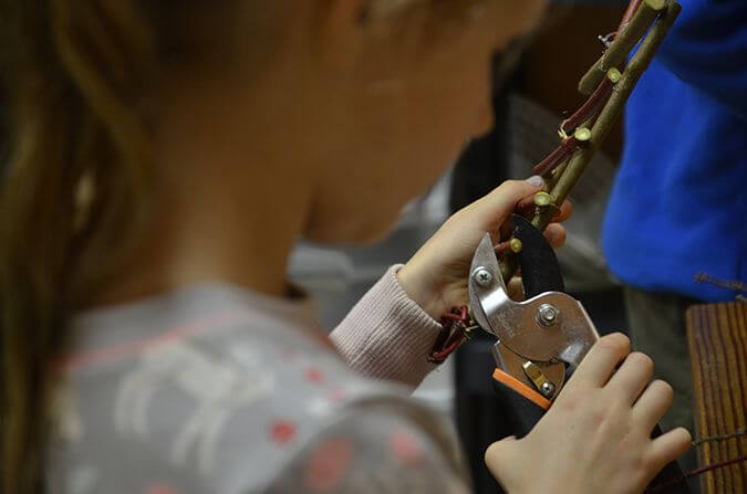 a young person working with their hands