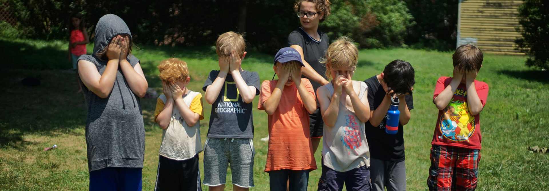 Kids covering their eyes