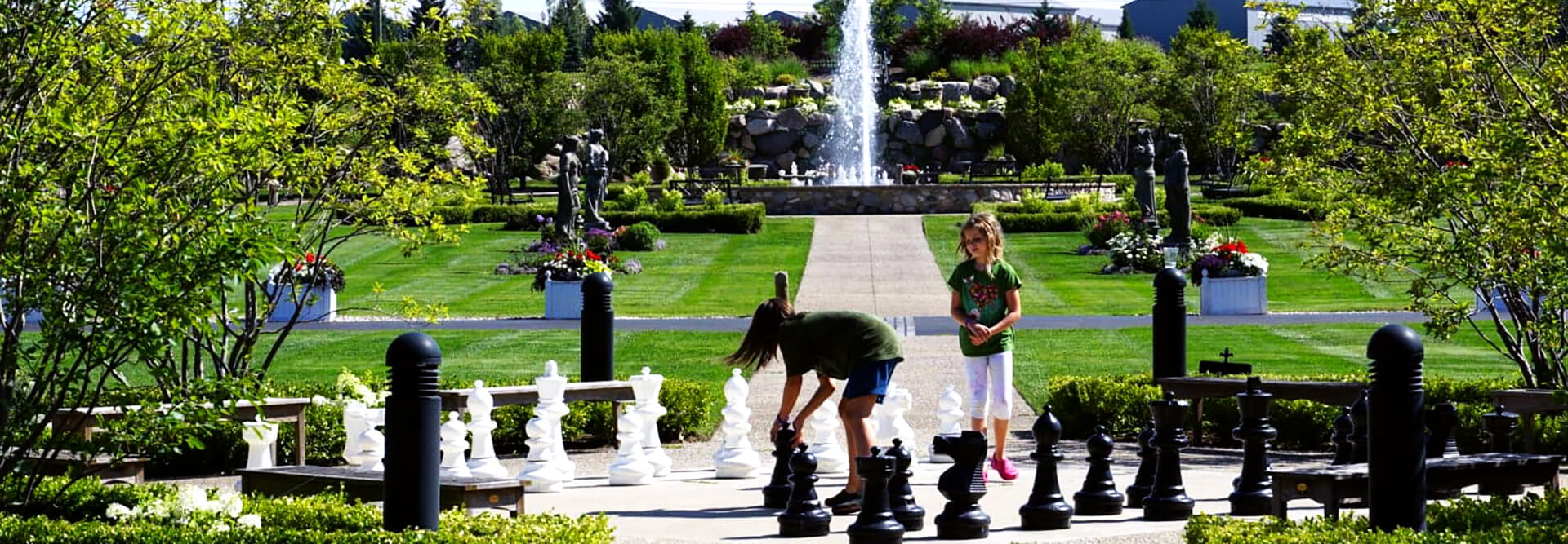 children playing a large chessboard