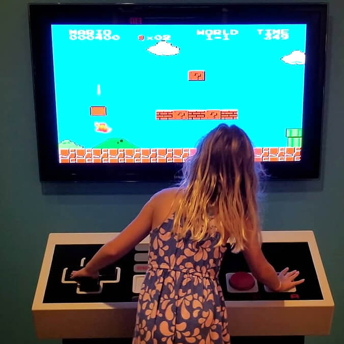a girl playing a video game