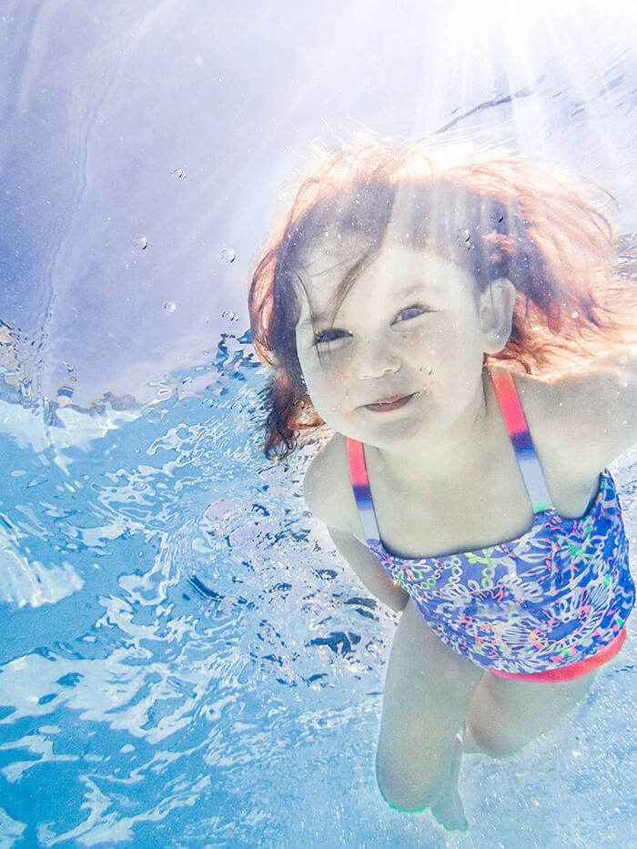 A child swimming underwater