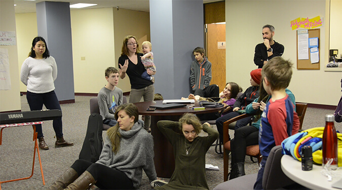 students in a school meeting