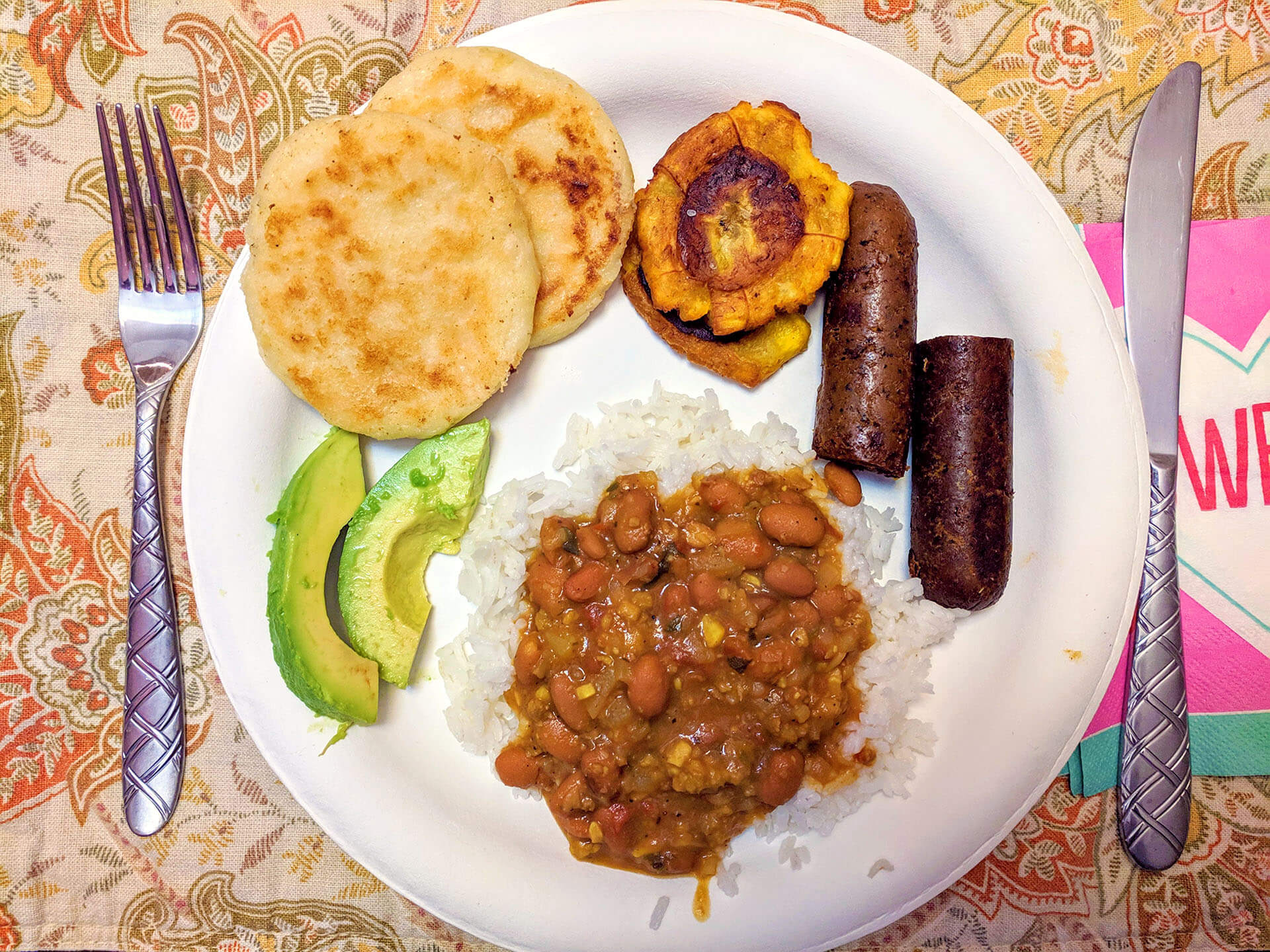 a plate of food with beans
