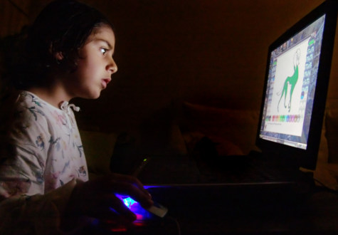 girl playing on computer